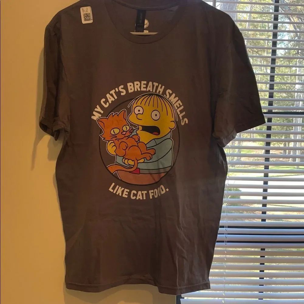 The Simpson’s Gray Graphic Tee Short Sleeve. My cats breath smells like cat food